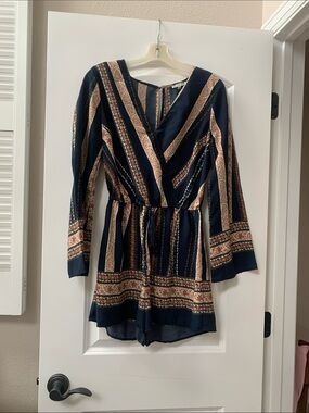 Flowing romper with open back